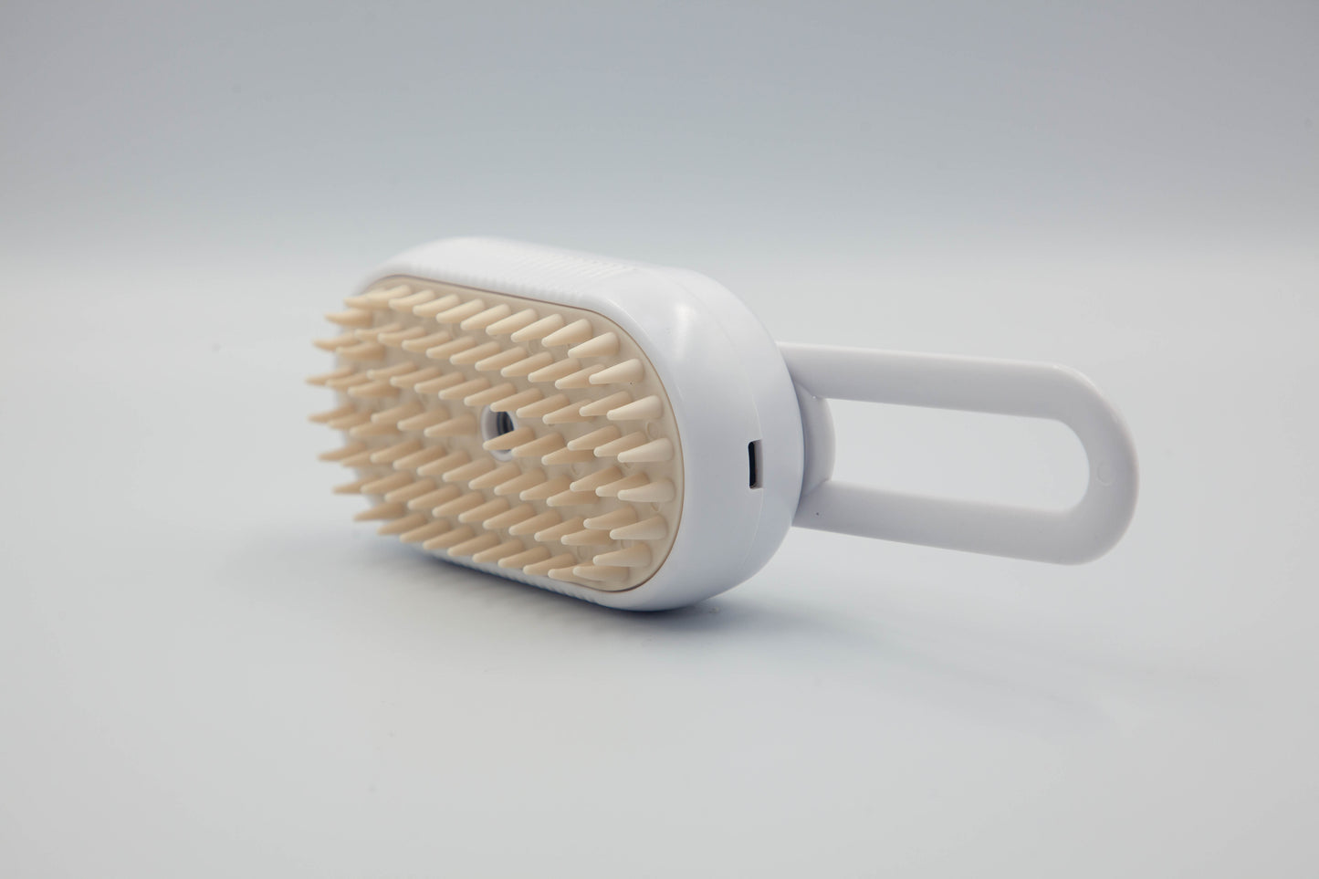Cepillo Eléctrico 3 en 1 para Peludos – Limpieza, Vapor y Masaje en un Solo Paso.