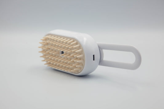 Cepillo Eléctrico 3 en 1 para Peludos – Limpieza, Vapor y Masaje en un Solo Paso.